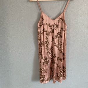 Pink slip with bronze embroidery